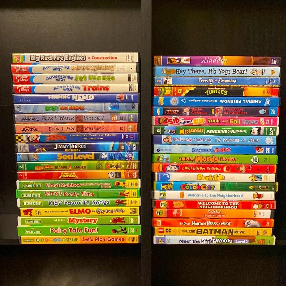 40 kids Dvd lot - Disney , Elmo , and many more